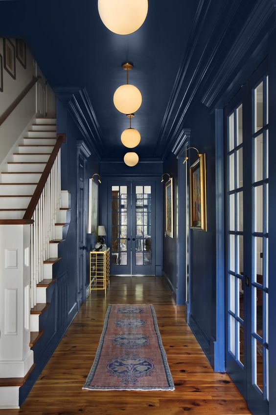 Colored corridor with Pickled Bluewood and gold accents