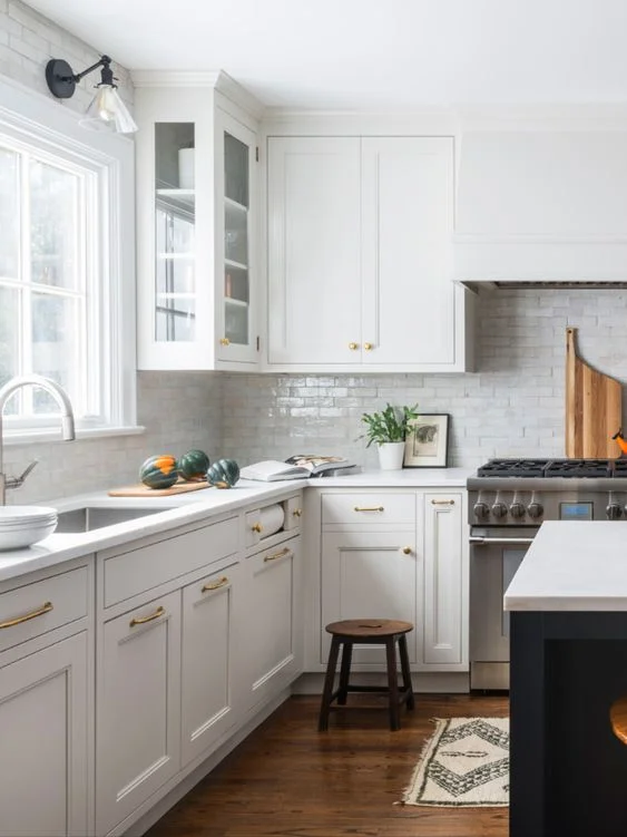 White Zellige 2 x 6 by Cle Tile in a classic white kitchen backsplash by Studio Dearborn